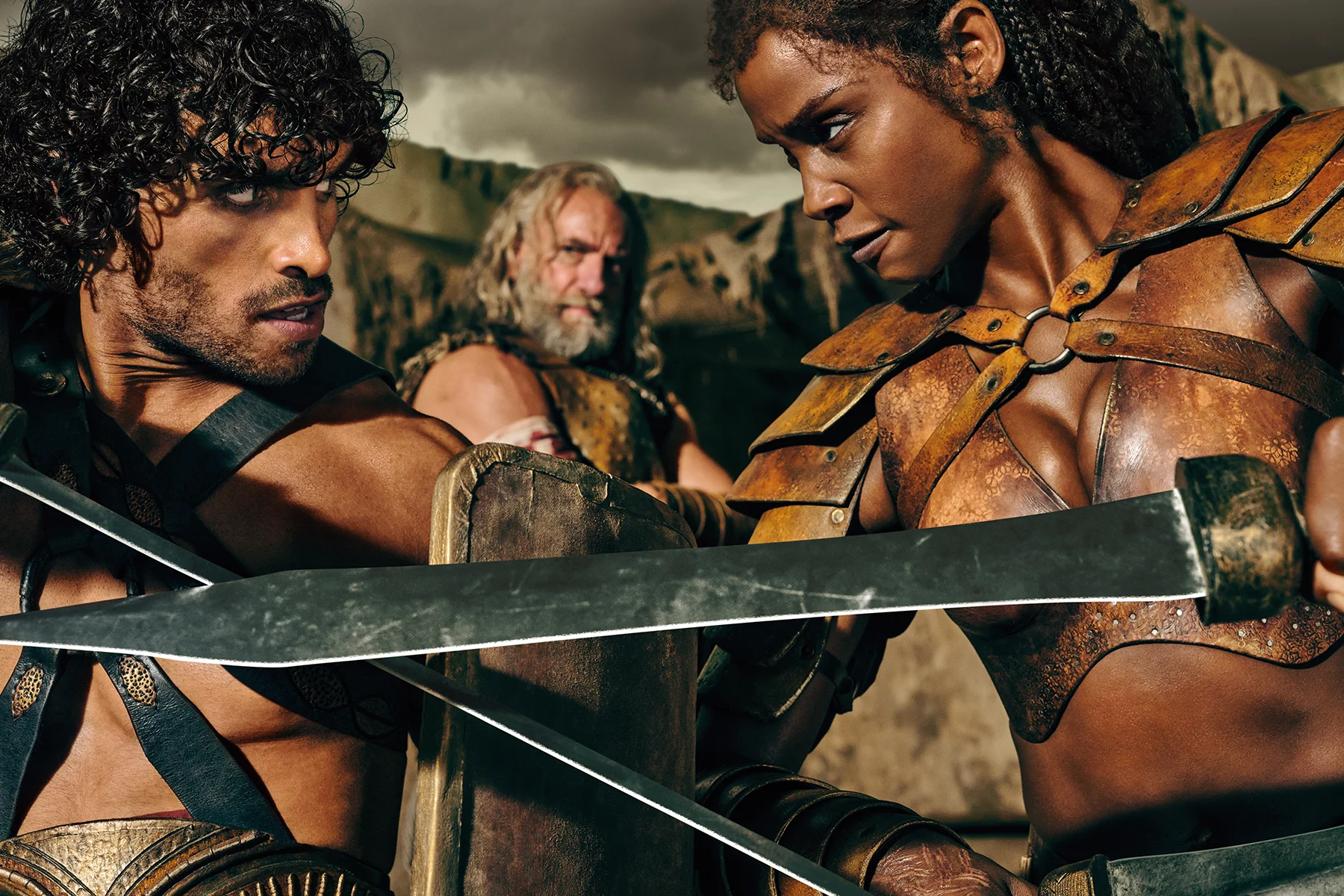 Spartacus_ House of Ashur_Left to Right_ Jordi Webber (“Tarchon”), Graham McTavish (“Korris”), and Tenika Davis (“Achillia”)